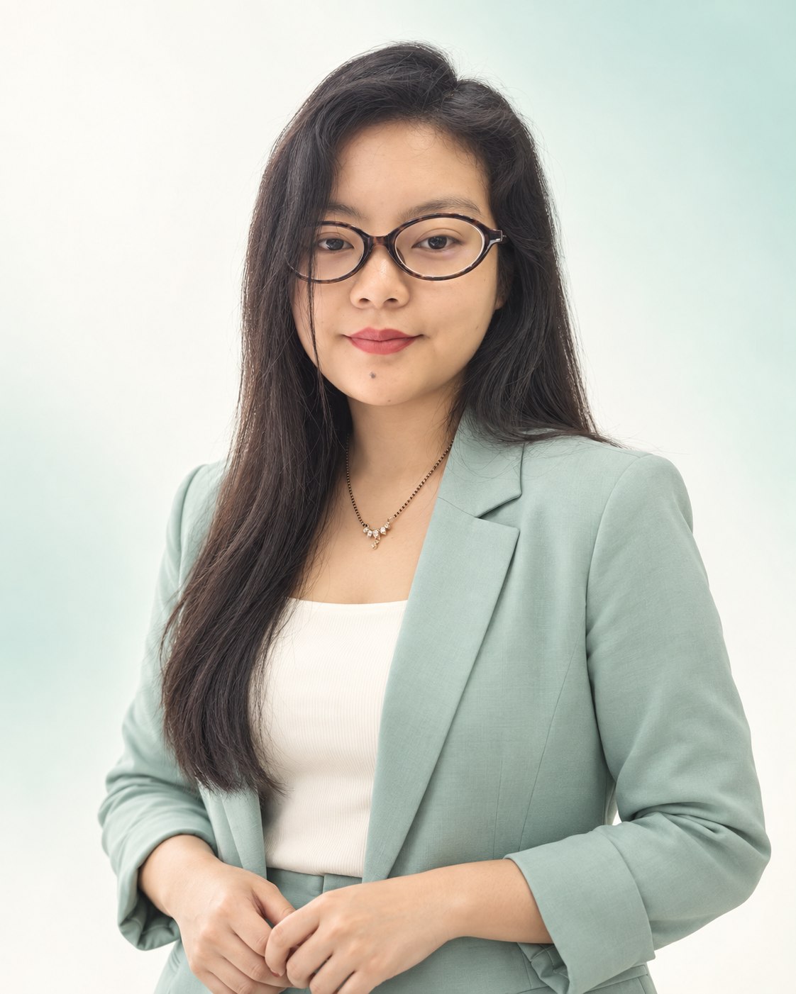Sherine Moktan wearing a mint green suit